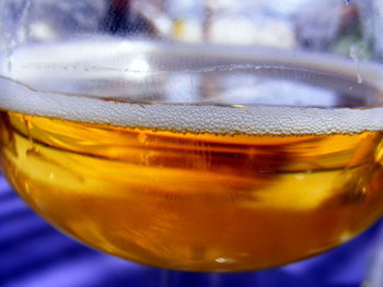 Close-up of beer glass on table