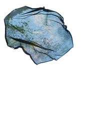 Close-up of paper over white background
