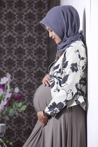 Rear view of woman with bouquet