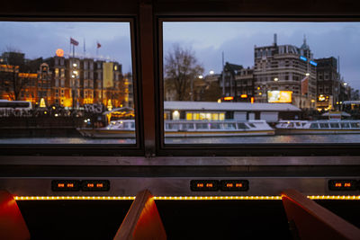 Illuminated buildings in city at night