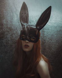 Portrait of woman wearing mask