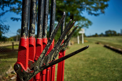 Close-up of red fence on field