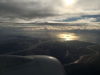 Cropped image of airplane on landscape