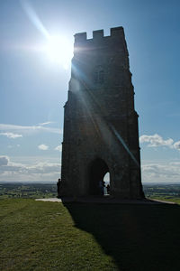 Sun shining through built structure