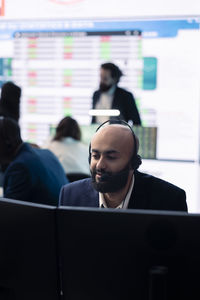 Man using laptop at office