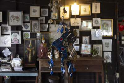 Electric lamps hanging on table