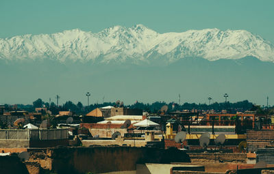 View of townscape against mountain range