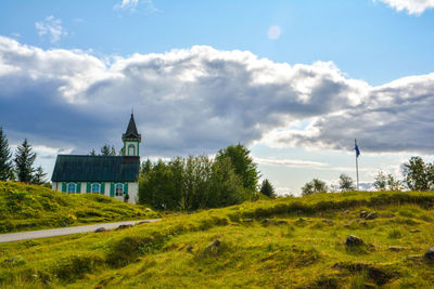 View of building against cloudy sky