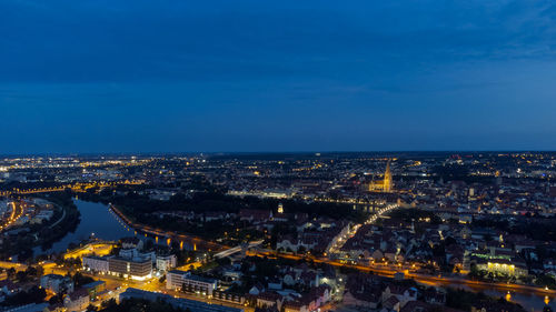 High angle view of illuminated city at night