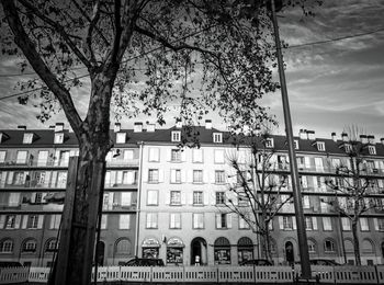 Buildings in city against sky