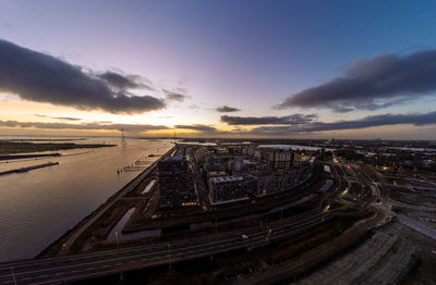 Amsterdam ijburg. high angle view of city at sunset.