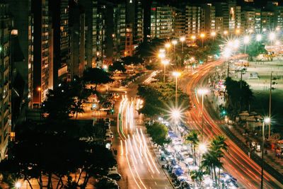 High angle view of light trails on city street at night