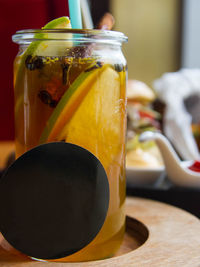 Close-up of drink in jar on table