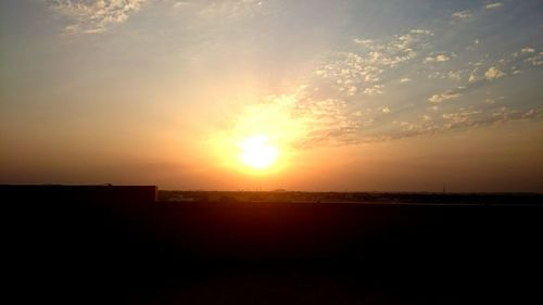 Sun shining through clouds