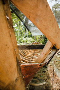 High angle view of rusty metal on wood