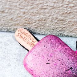 Close-up of heart shape on sand