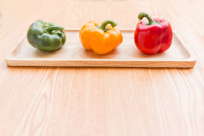 Close-up of bell peppers on cutting board