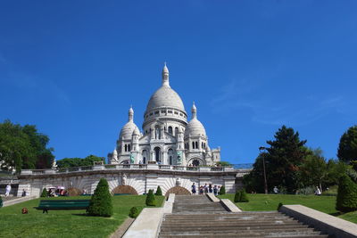 View of historic building against blue sky