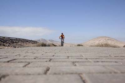 Spain, canary islands, fuerteventura, senior man on mountainbike