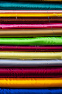 Variety of silk materials stacked on each other