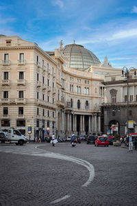 People in front of historic building