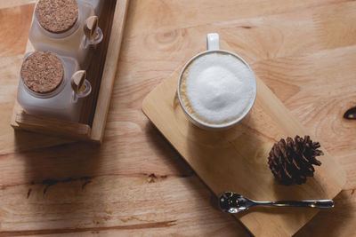 High angle view of coffee cup on table