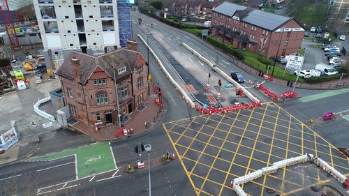High angle view of street amidst buildings in city