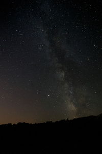 Low angle view of stars in sky at night