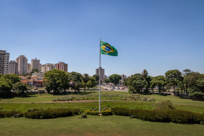 Low angle view of flag against sky