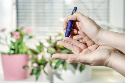 Cropped image of hands doing medical test