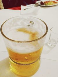 Close-up of beer on table