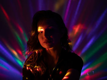 Portrait of woman with illuminated lights