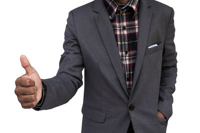 Close-up of human hand against white background