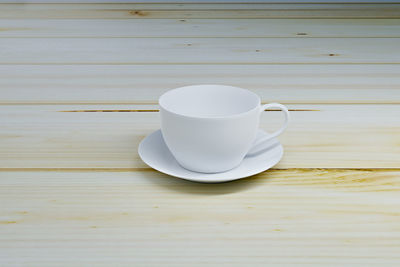 High angle view of coffee cup on table