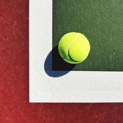 Close-up of yellow ball on the floor