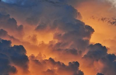 Low angle view of dramatic sky during sunset