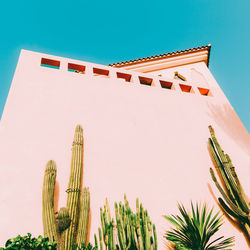 Low angle view of traditional building against clear blue sky