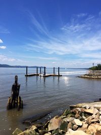 Scenic view of sea against cloudy sky