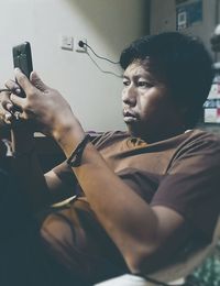 Portrait of young man looking away