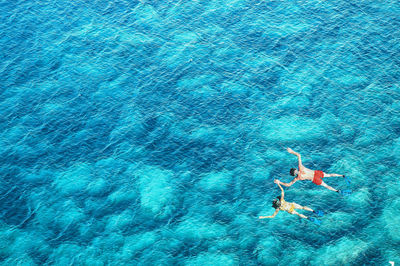 Woman swimming underwater