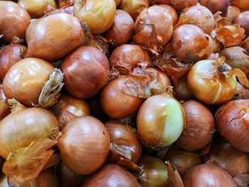 Full frame shot of onions for sale at market stall