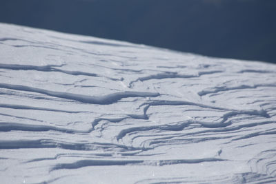 Aerial view of snow covered land