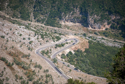 High angle view of winding road on landscape