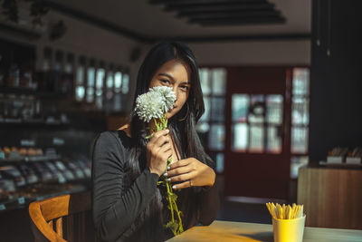 Portrait of a woman drinking glass