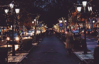 Cars on street at night