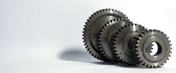 Close-up of machinery against white background