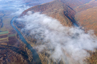 High angle view of smoke stack on land