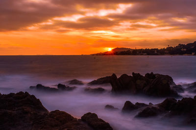 Scenic view of sea against sky during sunset