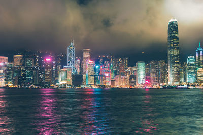 Illuminated buildings in city at night