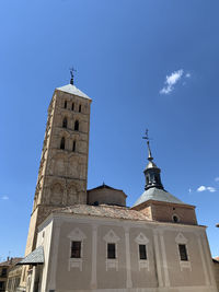 Low angle view of building against blue sky
